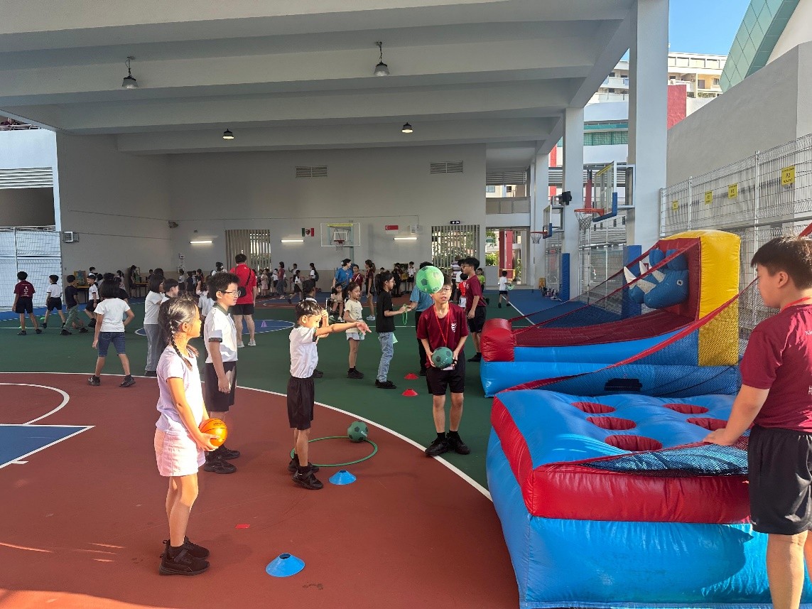 Students having fun at the carnival booths during Sports Carnival