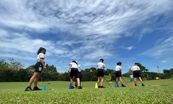 Our Primary 5 students participating in the Golf Sports Education Programme
